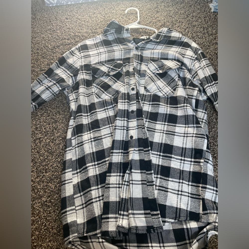black and white flannel with poetic justice on the back